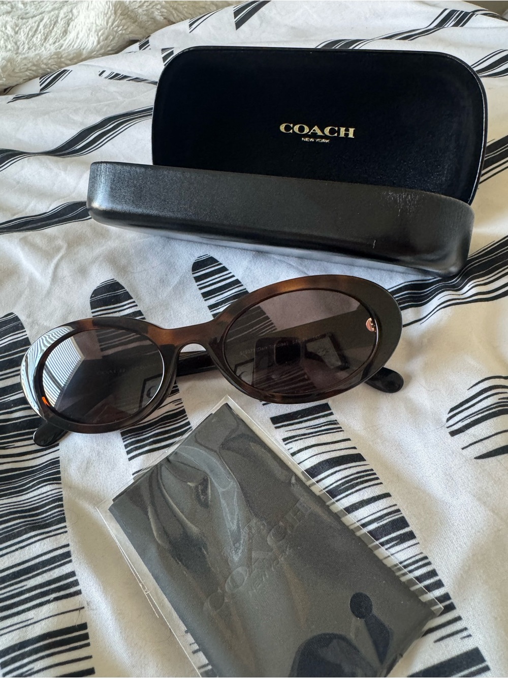 Coach Brown Oval Sunglasses with Dark Lenses